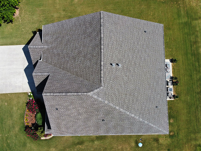 aerial top view of residential property for sale with new roofing installed woodstock ga