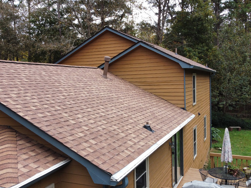 residential property exteriors with asphalt shingles roof repaired after insurance claim woodstock ga